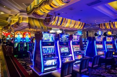 Jewels of Prosperity slot game interface with gem symbols and spin controls on cicak 2d